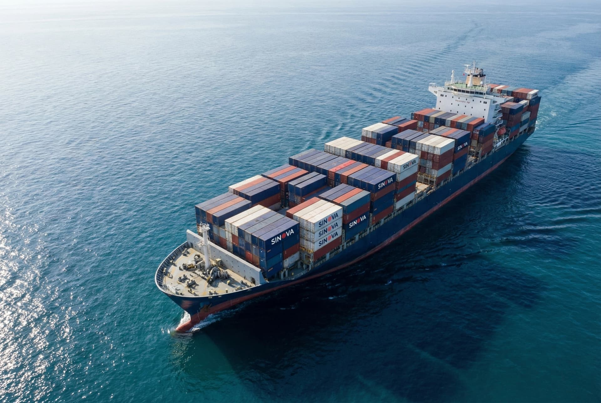 SINOVA Marine container ship sailing through calm azure waters